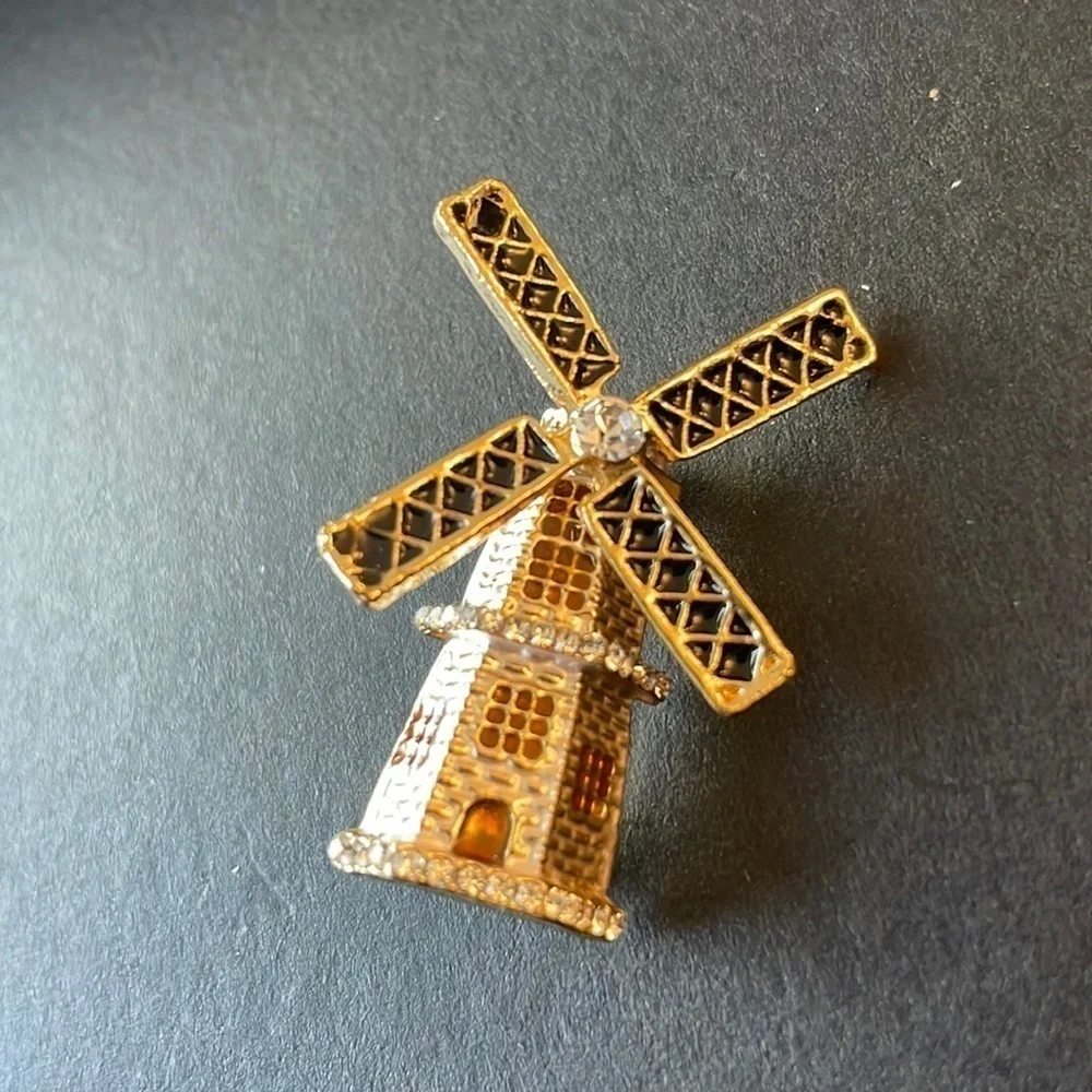 ANTHROPOLOGIE windmill  Gold Tone Brooch